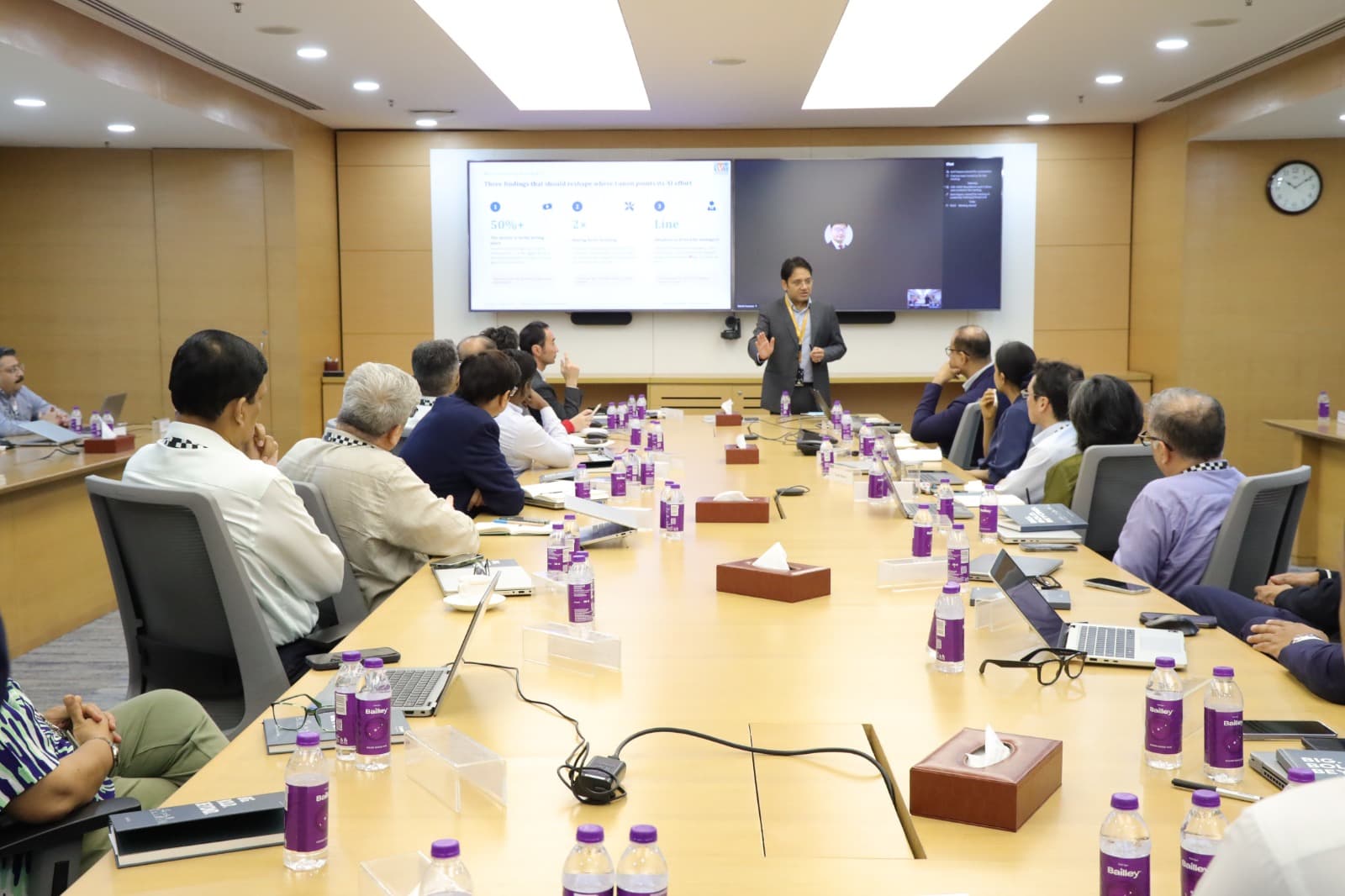 Enterprise teams collaborating in a practical AI workshop — program highlight 7