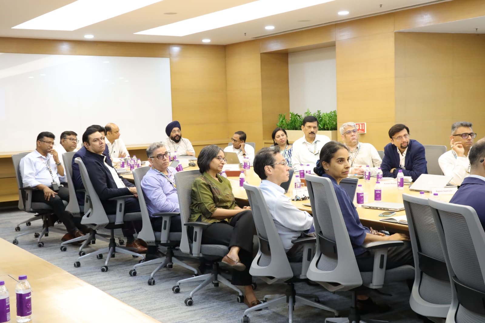Enterprise teams collaborating in a practical AI workshop — program highlight 9