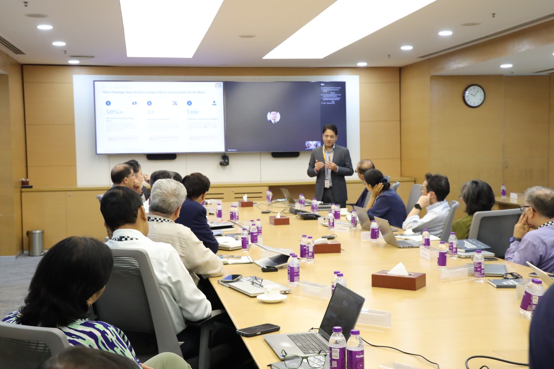 Enterprise teams collaborating in a practical AI workshop — program highlight 11